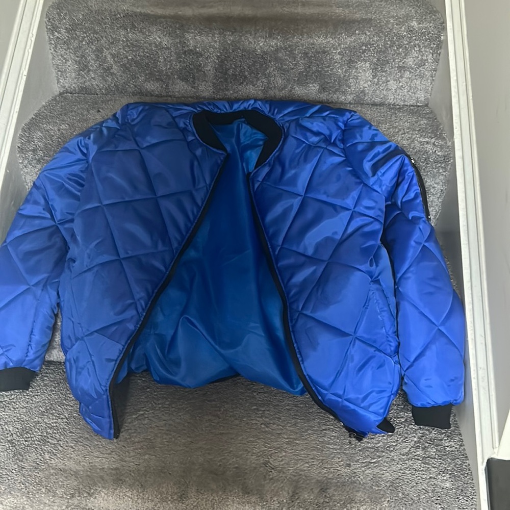 Blue bomber jacket for sale.